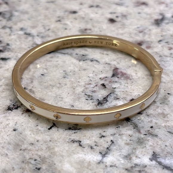 kate spade Jewelry - Kate Spade White Hinged Goldtone Bangle EUC